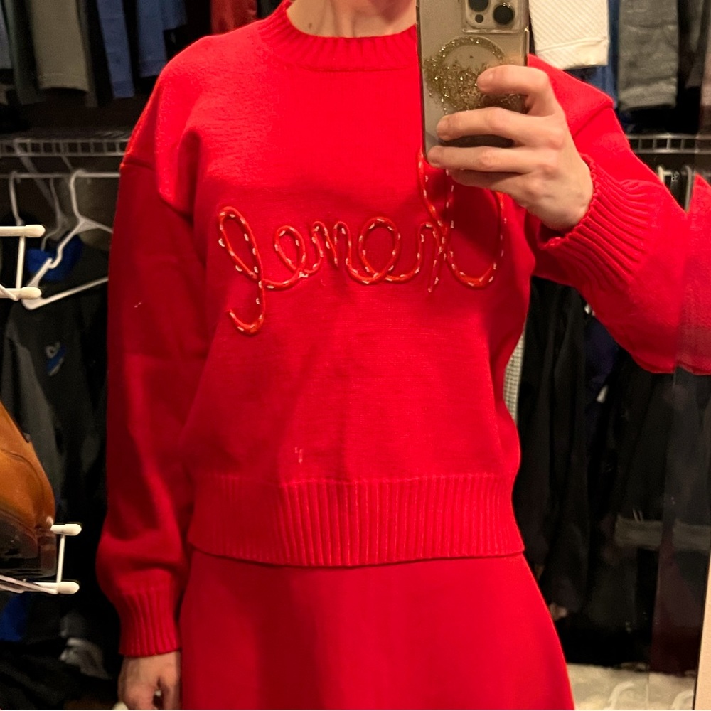 Red sweater with Chanel embroidered